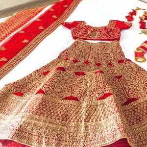 Red wedding bridal lehenga with dupattas